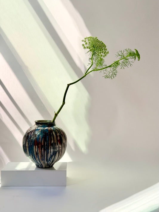 sculptural blue drip vessel