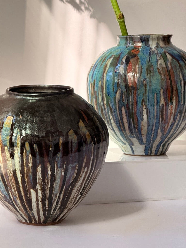 hand-thrown black drip glaze stoneware vessel