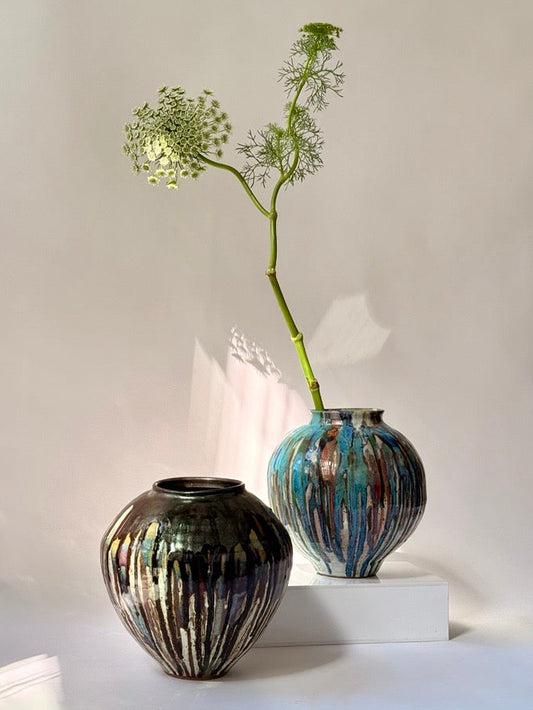hand-thrown black drip glaze stoneware vessel