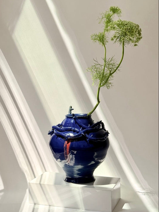 hand-thrown blue celadon glaze stoneware vessel