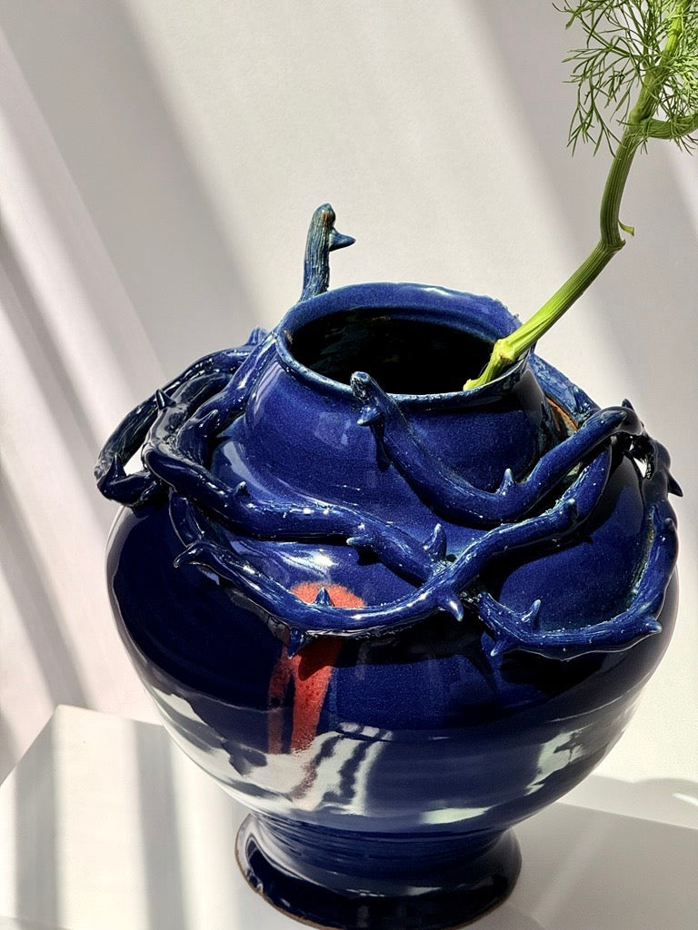 hand-thrown blue celadon glaze stoneware vessel